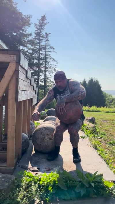 151 lb one arm atlas stone to shoulder.