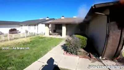 This firefighter kicking down doors like it's the movies