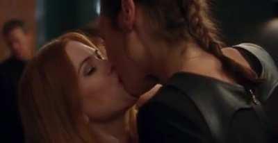 Isla Fisher and Gal Gadot making out in the middle of a group of guys. Wonder how they got there but it seems they are getting themselve into a good mood for a long night of sex. They will be gangbanged throughly.