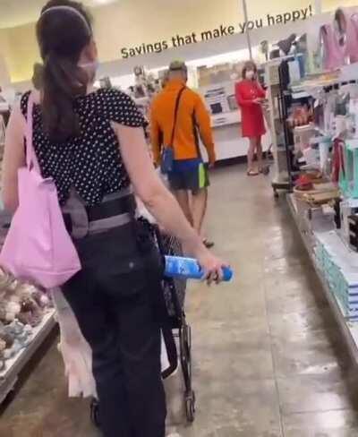 Spraying lysol in line at the supermarket- spraying it right in front of her baby's face. Child abuse.