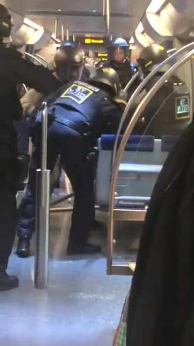 German Police in Chain Armor Arresting someone with an Knife