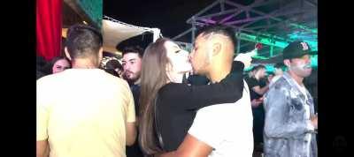 Brazilian guy making out with sexy blonde girl