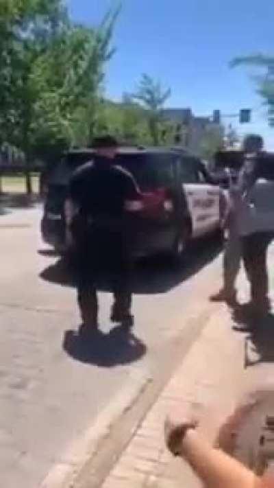 Good cop in Jackson, Tennessee, dropping off water supplies for protestors