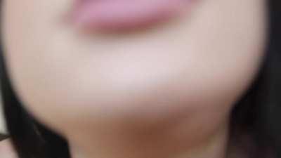 Licking her squirt off the camera before drenching it again