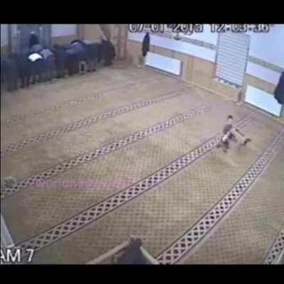 Child moves the chair out from under an old man praying namaaz