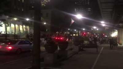 Rioters launching mortars into the courthouse.