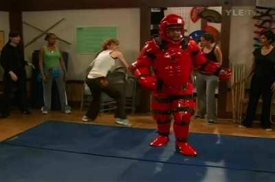 Saige Thompson Verbals and Rachelle Lefevre Repeatedly Kicks a Man in the (Padded) Balls During a Self-defense Class in Life on a Stick 1x13