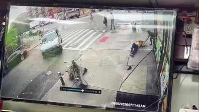 Manhattan shop owner saves man who was struck by a car. Driver later escaped on foot but was arrested. Victim is recovering in Harlem hospital.