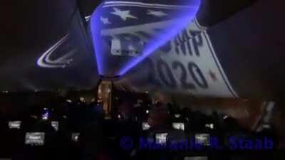 On a plane from TX DC flight attendants are struggling to control a plane full of Trump supporters as they display a pro-Trump projection and harass others passengers bound for DC.