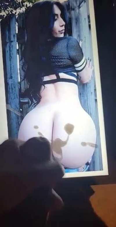 Long black hair, nails done, peachy ass bent over, definitely worth the nut.