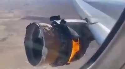 Plane engine on fire during flight