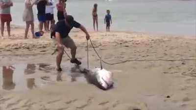 Psychos pull a shark out of the sea and suck all of the water from it so he can die faster