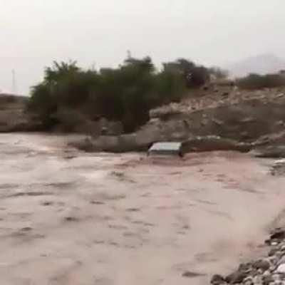Trying to drive into flood with your off-road car (Baluchistan province of Iran)
