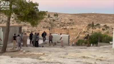 Masked Israeli settlers trespass on a Palestinian home and attack Palestinian family with clubs, cracking their skulls, in the West Bank. Israeli soldiers then arrest and interrogate a Palestinian. None of the Israeli settlers were arrested or charged.