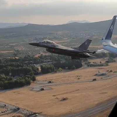 F-16 'Zeus' of the Hellenic Airforce Demo Team flying close to an A320 at Athens Flying Week