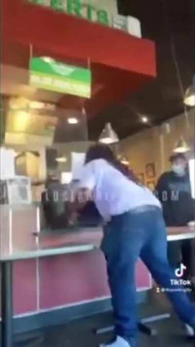 Man throws a cash register through the window when his refund for his chicken wings is denied.