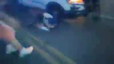 Detroit police officer drives through a crowd of protesters, hitting the gas, stopping and speeding forward. Multiple injuries reported.