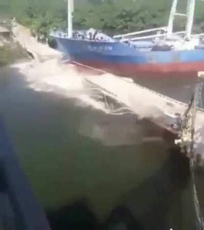Cargo ship crashes into bridge