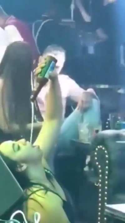 Lady having a bit too much fun in public.