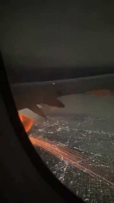 You look out the airplane window and see this, what you do?