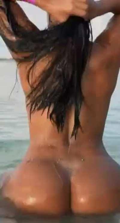 Beautiful Wet Body On The Beach