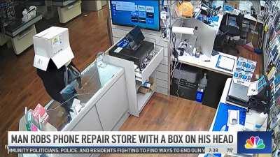 Florida Man Robs Phone Repair Shop Wearing a Box on Head with No Eye Holes, Cannot See and Has to Lift off Box, Leading to His Identification and Capture