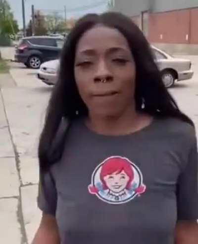 Woman in a Wendy's shirt says 