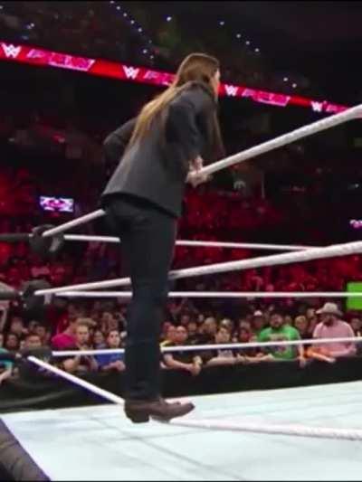 Busty Stephanie McMahon nearly spilling out of her shirt!