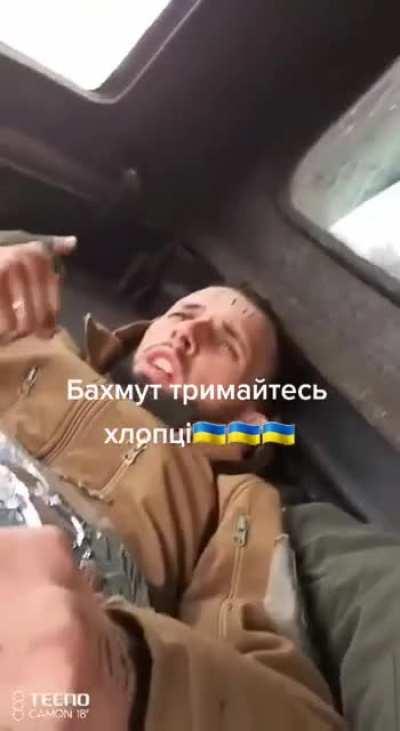 An injured Ukrainian soldier gets evacuated from Bakhmut. Meanwhile, he tells the other soldier filming: 