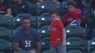 Kid throws home run ball back
