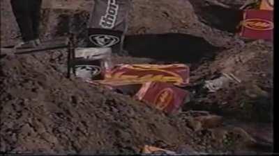 Ricky Carmichael gets taken out whilst running back for his bike