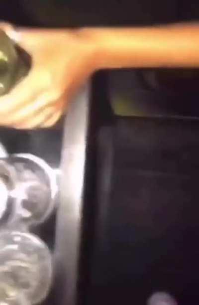 to discreetly piss in a glass on the dance floor