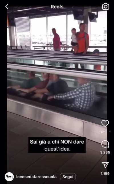 Occupying the moving walkway at the airport