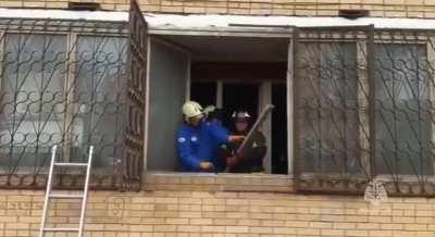 A 400-kilogram Russian being evacuated