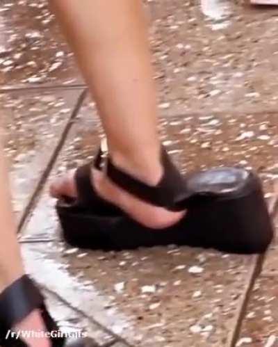 That's awkward...but they make her look taller!