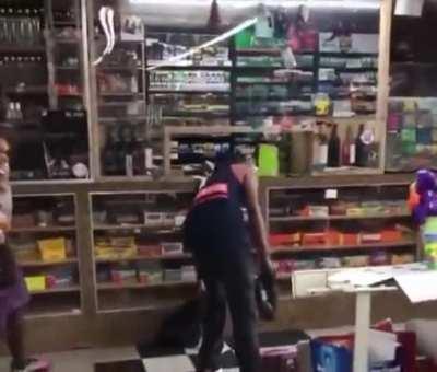 To scare the store worker.
