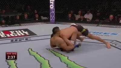 Kevin Lee goes full Diaz Bros Inc., forgets he's not a good boxer, and gets his right hook timed for a TD by Leonardo Santos.