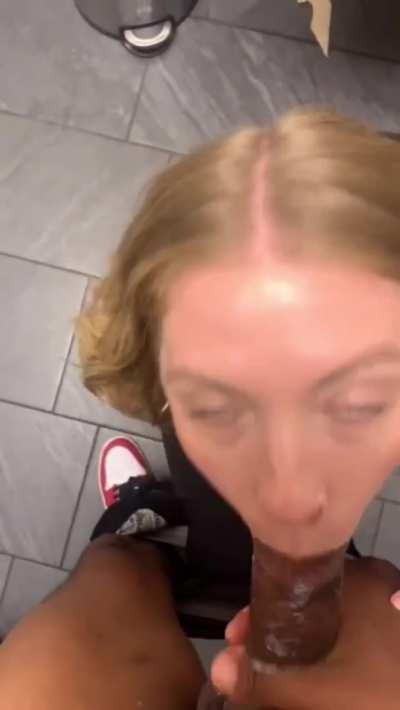 white girl gives head in public bathroom