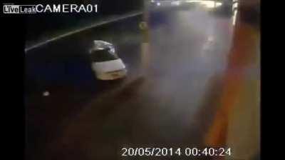 Car wraps around Pole