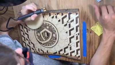 Wood burning art.
