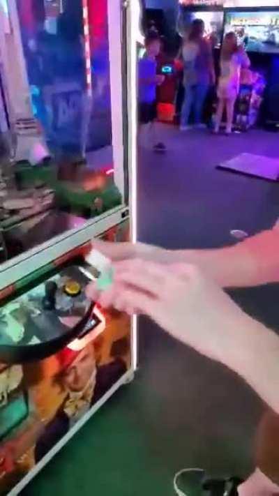 I played the Willy Wonka coin pusher when disaster struck.