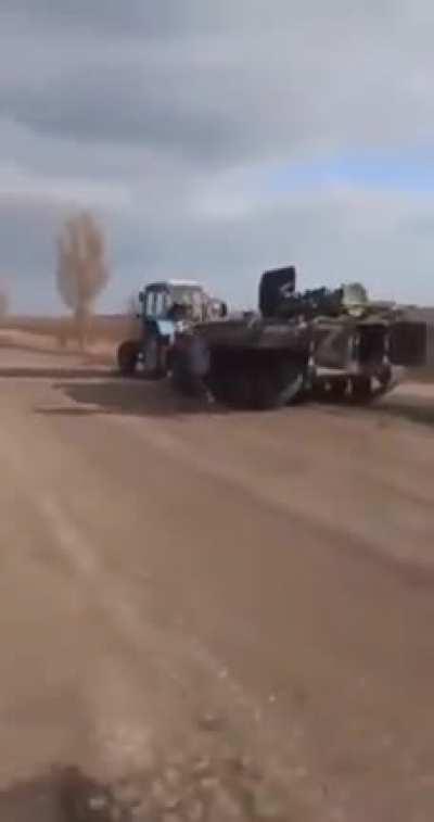 Why waste NLAWs on an MTLB armored vehicle when you can just tow it away?