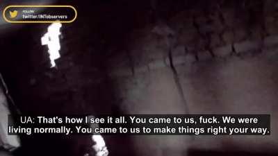 A Ukrainian soldier has a verbal exchange with a Russian invader in a close-range battle.