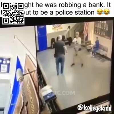 Man tries to rob police station.