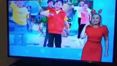 When you're supposed to sign language for the hard of hearing and act professionally but the music just too dam good