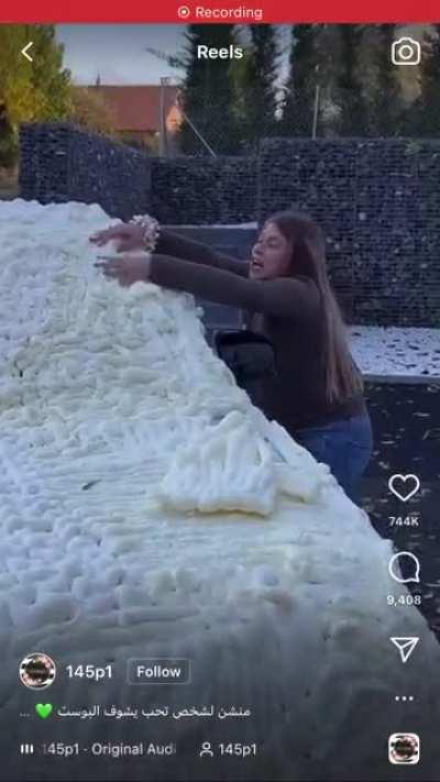 Asshole completely covers someone’s car in foam insulation spray. Look at her face….