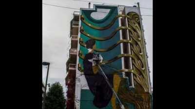 The making of this surreal mural