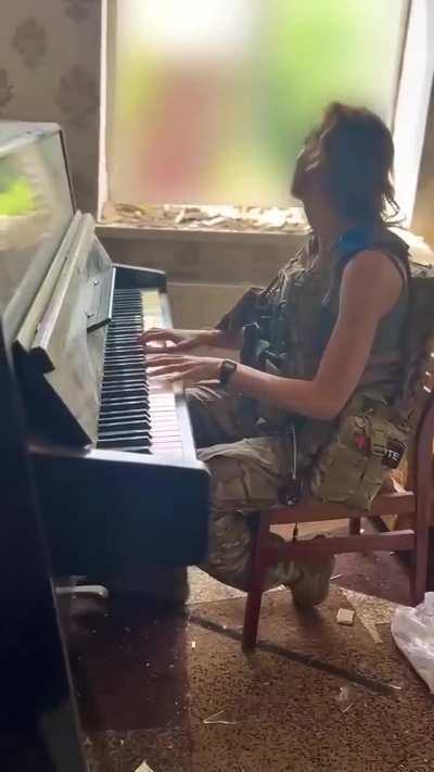 Combat Medic Rebekah Maciorowski: My soldiers found a piano for me to play! On the most stressful days, small acts of kindness from my boys, like locating a piano in a shelled house and clearing the debris so I can come play music, helps me keep going