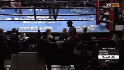 Fighter (Curtis Harper) walks out of the ring after the fight starts.