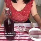 Opening a bottle of homemade wine that hasn't fully fermented